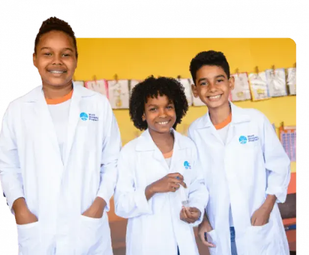 Young kids working with the World Mosquito Program at school